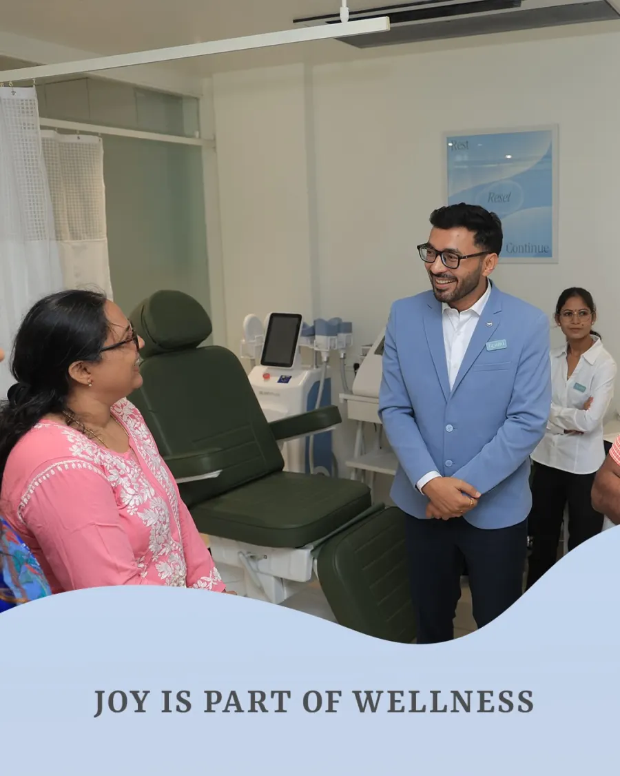 Dr. Dhrumit Gohil with a guest in the treatment room