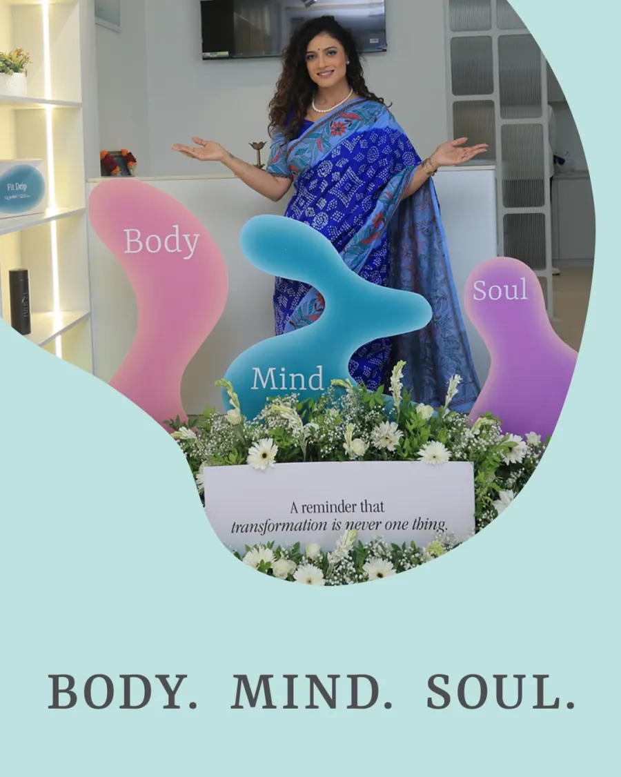 Izumi reception with Body, Mind and Soul sculptures and fresh flowers